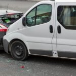 Car and van collision on the road in Australia, vehicle damage.