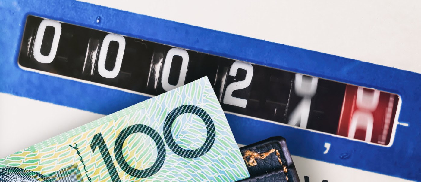 High-quality Australian currency notes and a coin counter machine for cash handling.