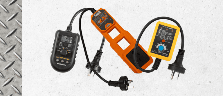 Earth leakage tester with orange and black casing, used for electrical safety inspections.